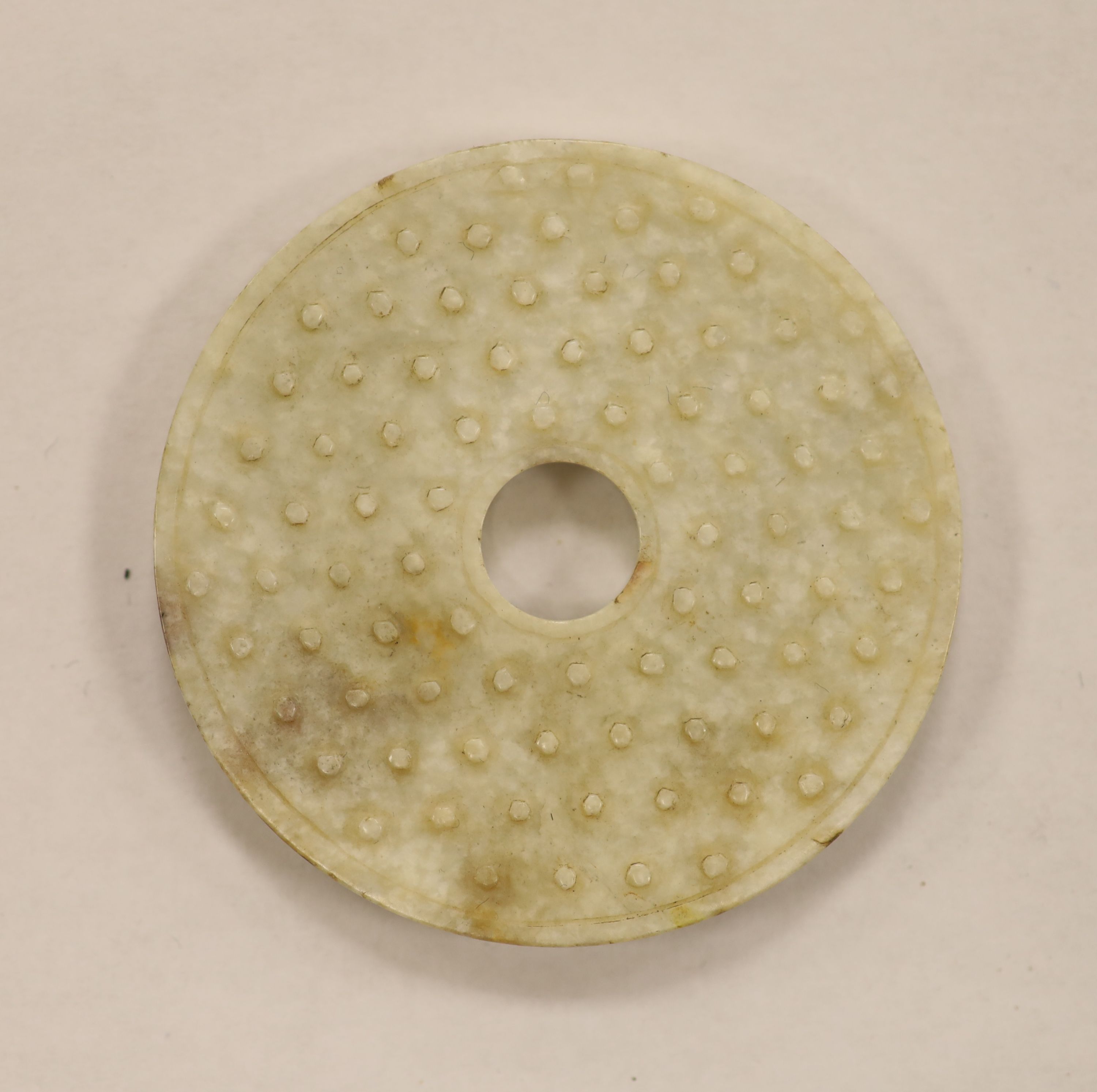 A quantity of assorted jade bi discs and other hardstones